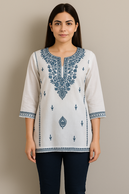 Women's white linen blouse with blue embroidery in L