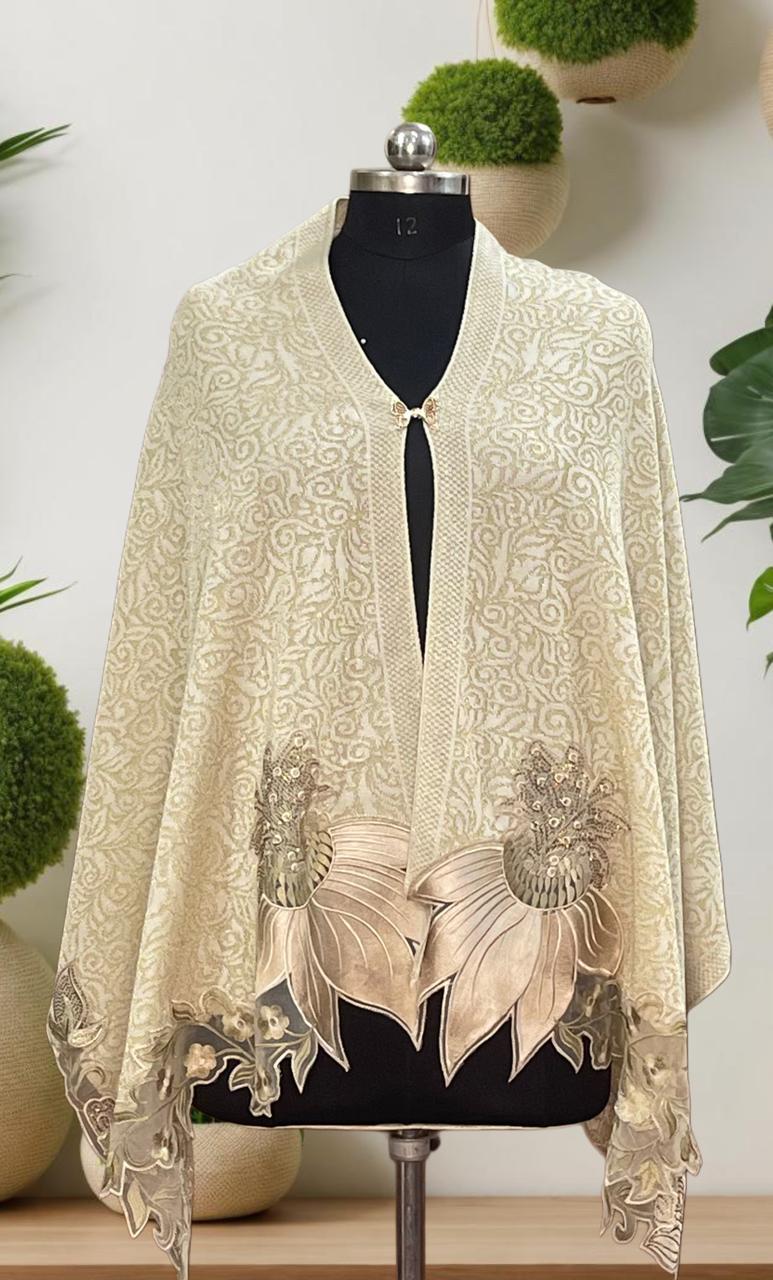 Women's knitted shawl with appliqué floral borders