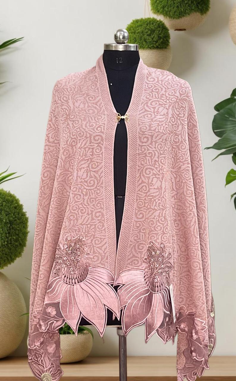 Women's knitted shawl with appliqué floral borders
