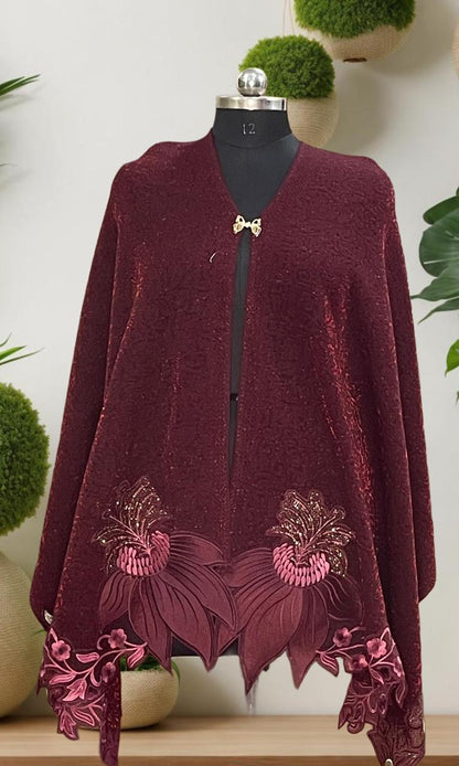 Women's knitted shawl with appliqué floral borders - detail view