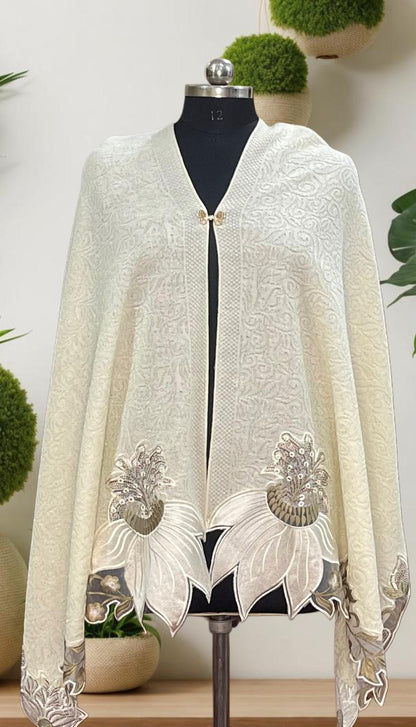 Women's knitted shawl with appliqué floral borders