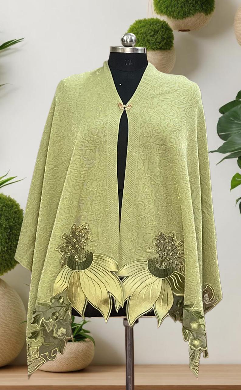 Women's knitted shawl with appliqué floral borders