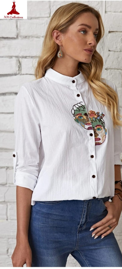 Women' short rayon blouse with face embroidery in XS and 2XL