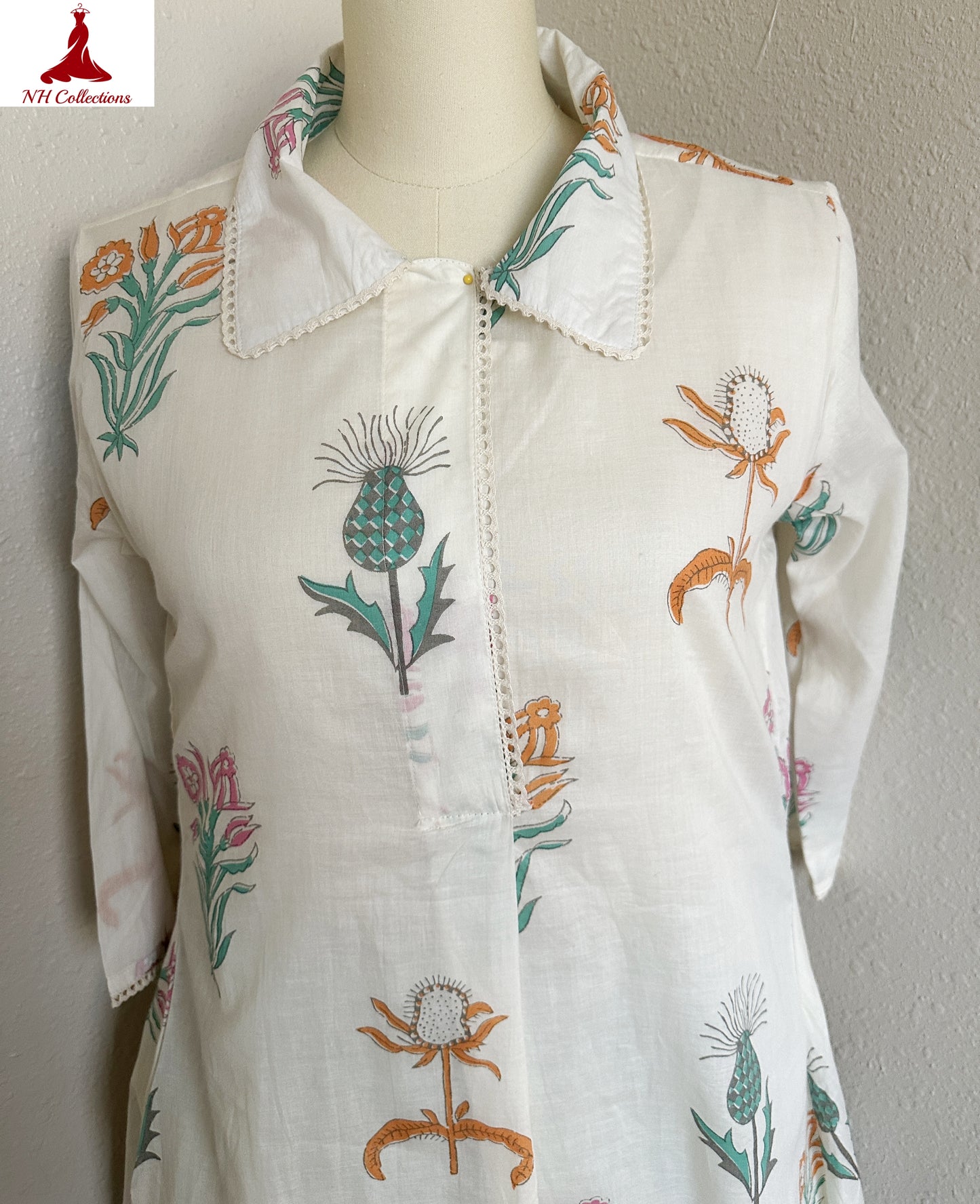 Women's beige floral block printed A-line Kurta with sage green pants in M