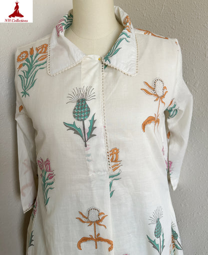 Women's beige floral block printed A-line Kurta with sage green pants in M