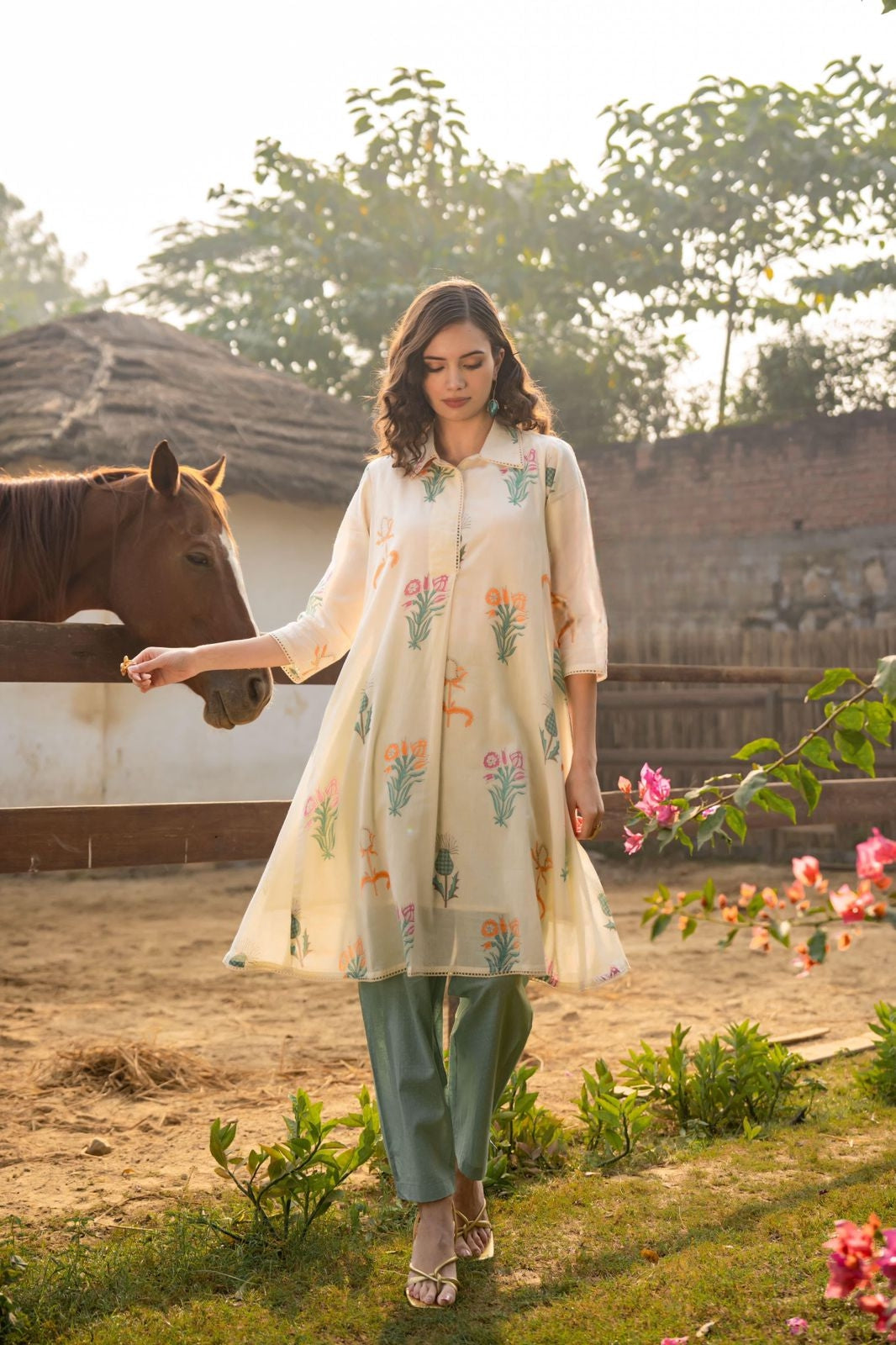 Women's beige floral block printed A-line Kurta with sage green pants in M