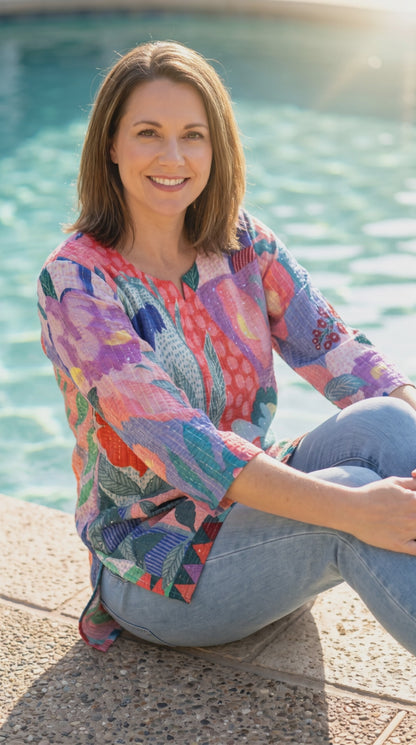 Women's multi-colored blouse in L